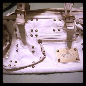 Louis Vuitton studded riveting white lambskin